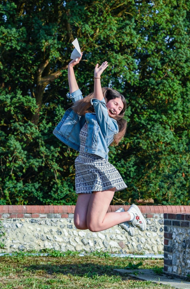 Young Julia Hinton jumps for joy after getting her results