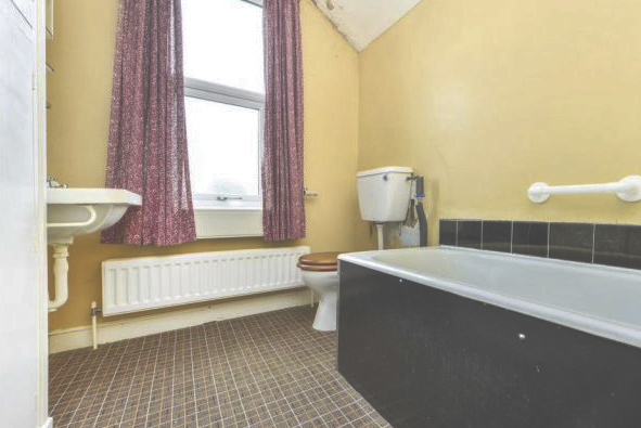 The bathroom as advertised in the terraced property 