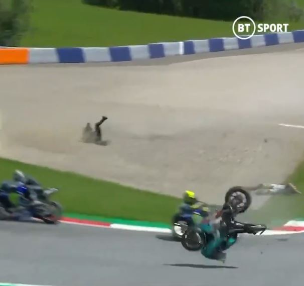 Morbidelli and Zarco can be seen flung across the ground