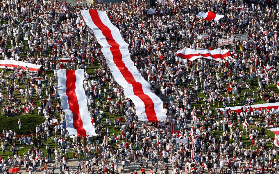 Opposition rallies swelled in size as they united under Belarus's former red and white flag