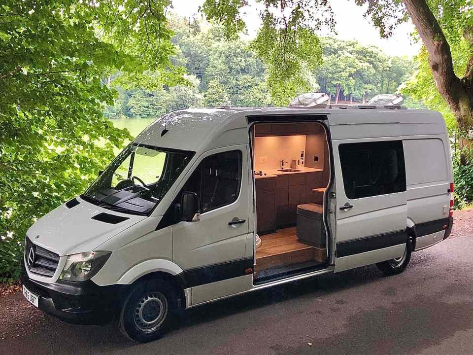 The exterior is your typical work van, but inside is a perfectly-fitted living area