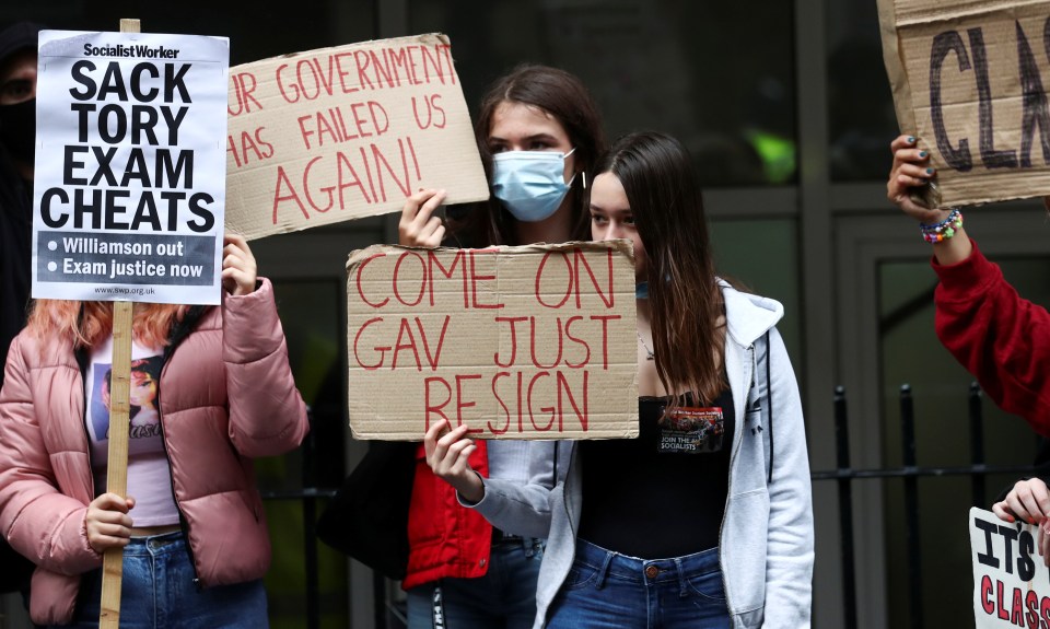 Students attend a protest on Sunday calling for Williamson's resignation