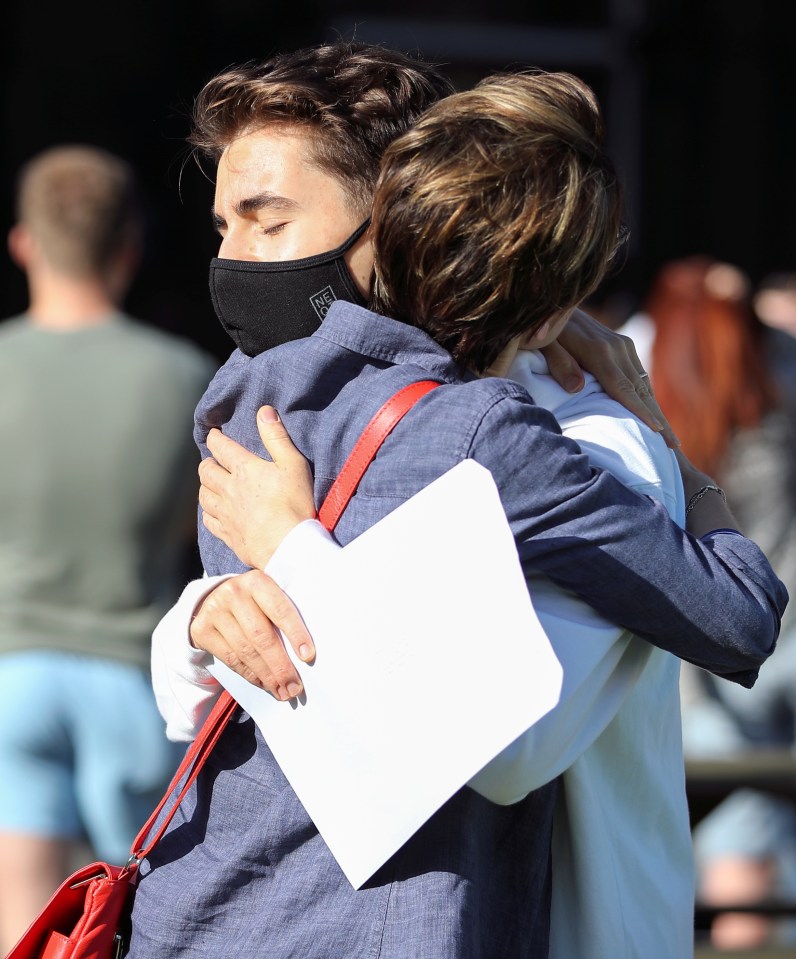 One student was given a big hug as he received his results at Crossley Heath Grammar School