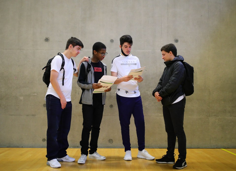 Pals look over their scores together at Ark Evelyn Grace Academy, London