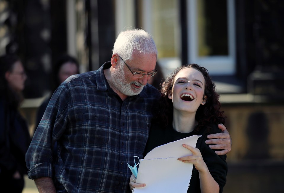 One student laughed with joy as she collected her results in Halifax