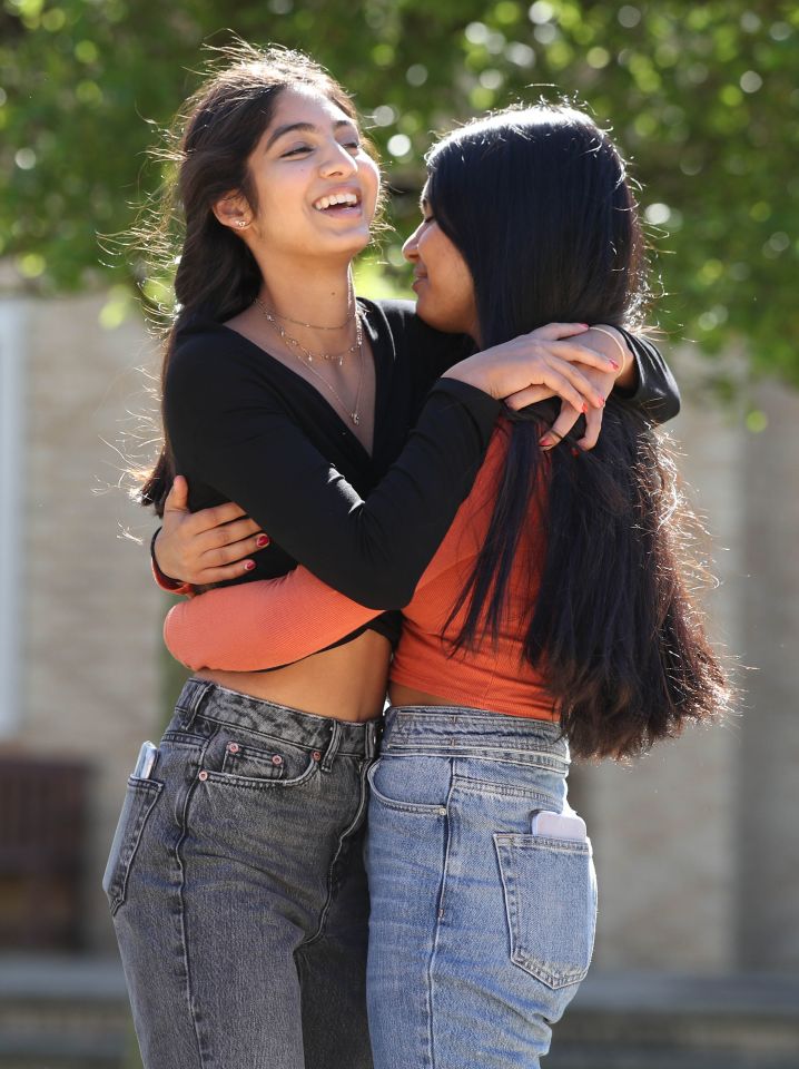 Twins Esha and Risha Gupta get their results at a grammar school in Leeds