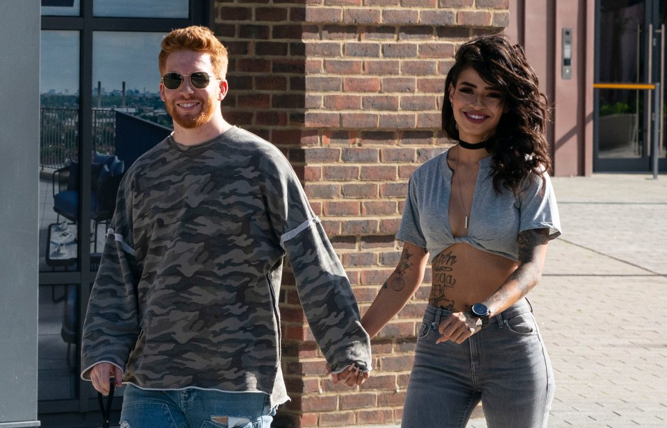 Neil and Luisa were pictured holding hands while out together today