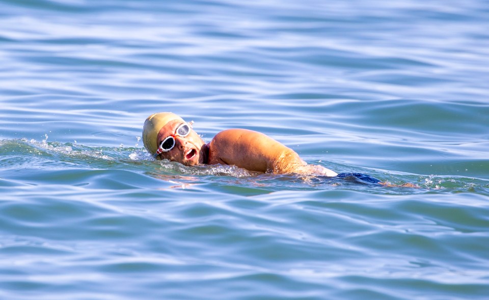 He practiced a bit of front crawl while he was in the sea