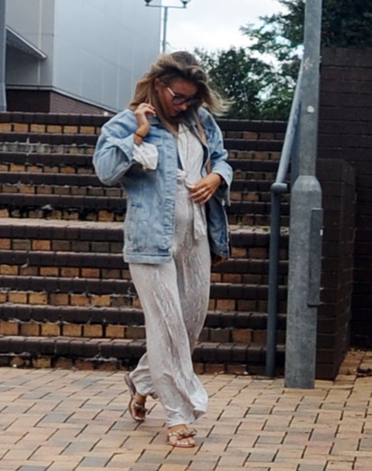 Dani Dyer showed off her baby bump as she stepped out in Enfield