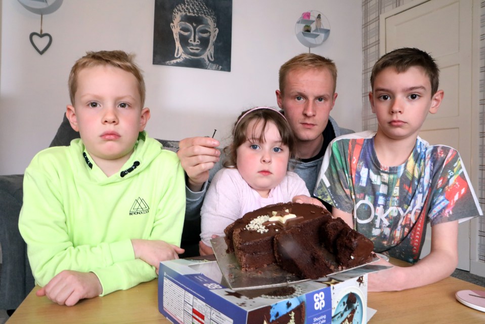 James Baxter with Jack Winstanley, 7, Olivia Watson, 5, and Harry Winstanley, 10