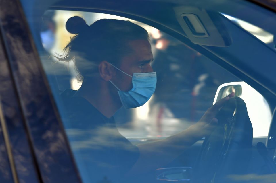 Antoine Griezmann wears a mask as he arrives for Barcelona Covid-19 testing