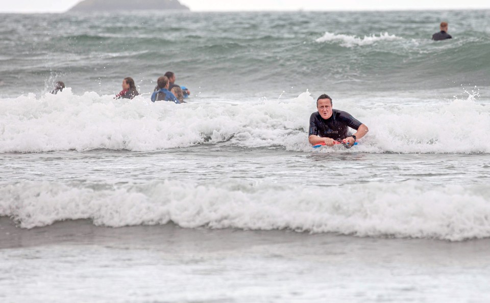 Mr Cameron, 53, was spotted at ­Polzeath in Cornwall