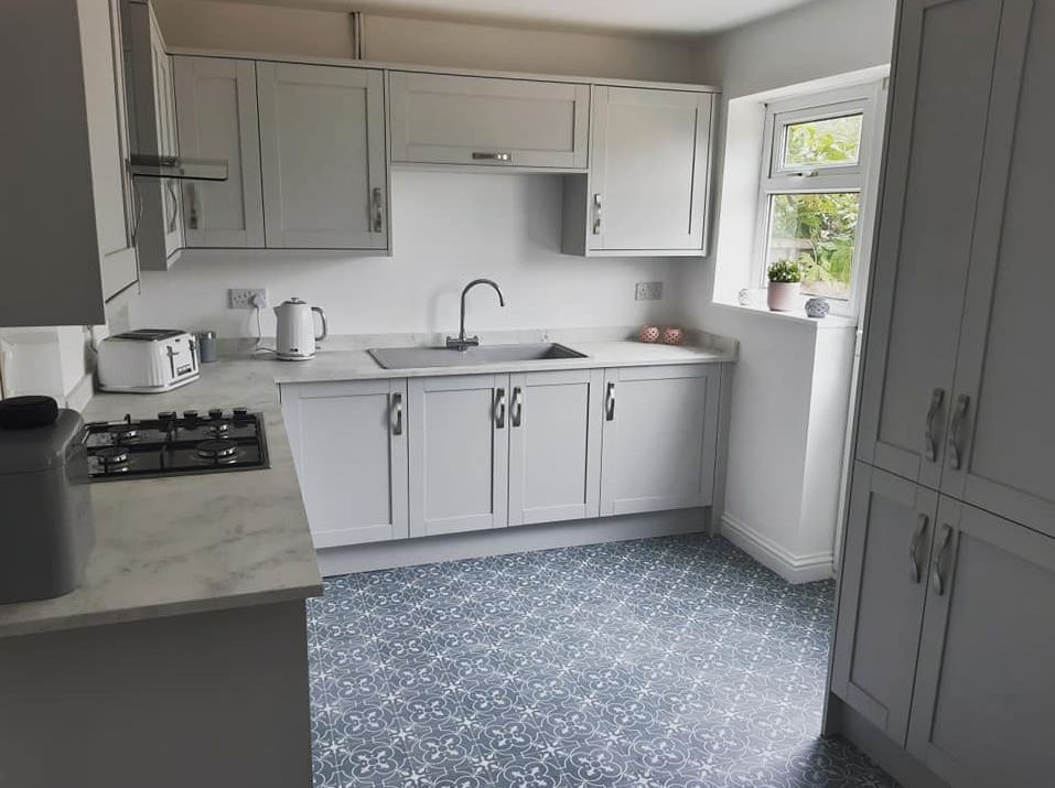  Her kitchen is now decorated in modern grey tones