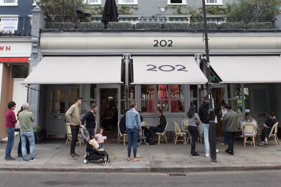 People lined-up at a participating restaurant in Notting Hill, London