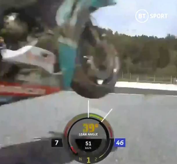 Rossi cheated death by millimetres as the bike is thrown in front of him