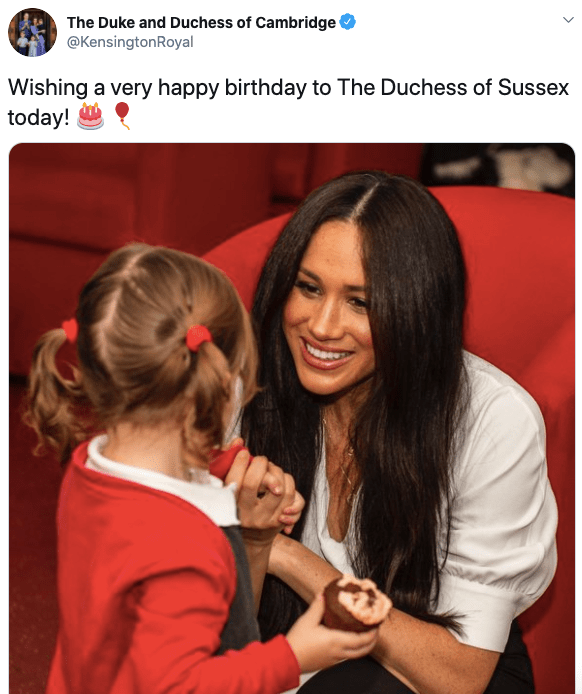 Kate Middleton and Prince William shared a photograph of Meghan smiling with a child for her birthday message