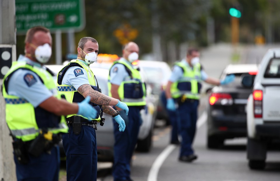 Police in face masks in the New Zealand city of Auckland, in a photo from April.