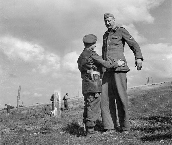 Bob captured the tallest soldier in the German army in a comic David and Goliath moment