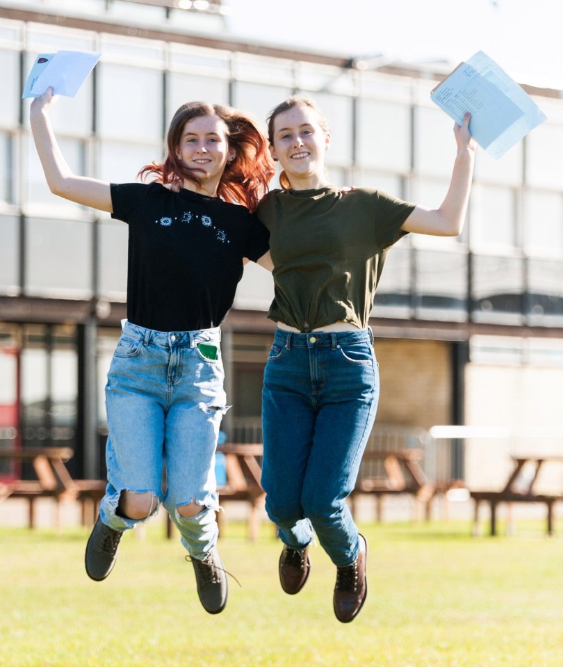 Two pals jump for joy at Smithdon High School in Norfolk