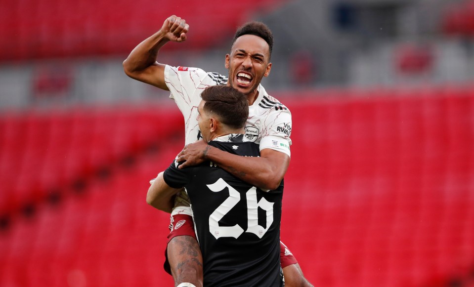 Aubameyang ran to celebrate with goalkeeper Emiliano Martinez