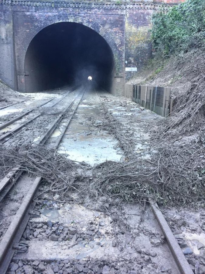 Torrential rain causes a landslide on a rail line in Micheldever, Hampshire