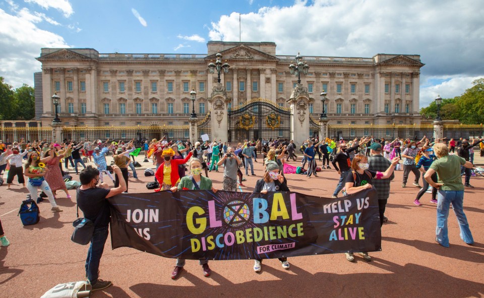 Large groups gathered outside the palace in scenes of chaos in the capital