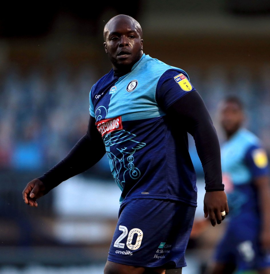 The Fleetwood staff member who described Adebayo Akinfenwa as a 'fat water buffalo' has escaped punishment from the FA