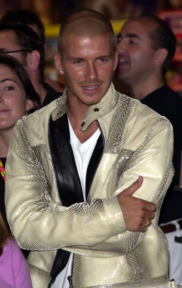 David wears a snakeskin effect leather jacket in 2000