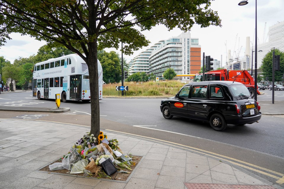 Floral tributes left for Emily by the roundabout in Battersea where she died