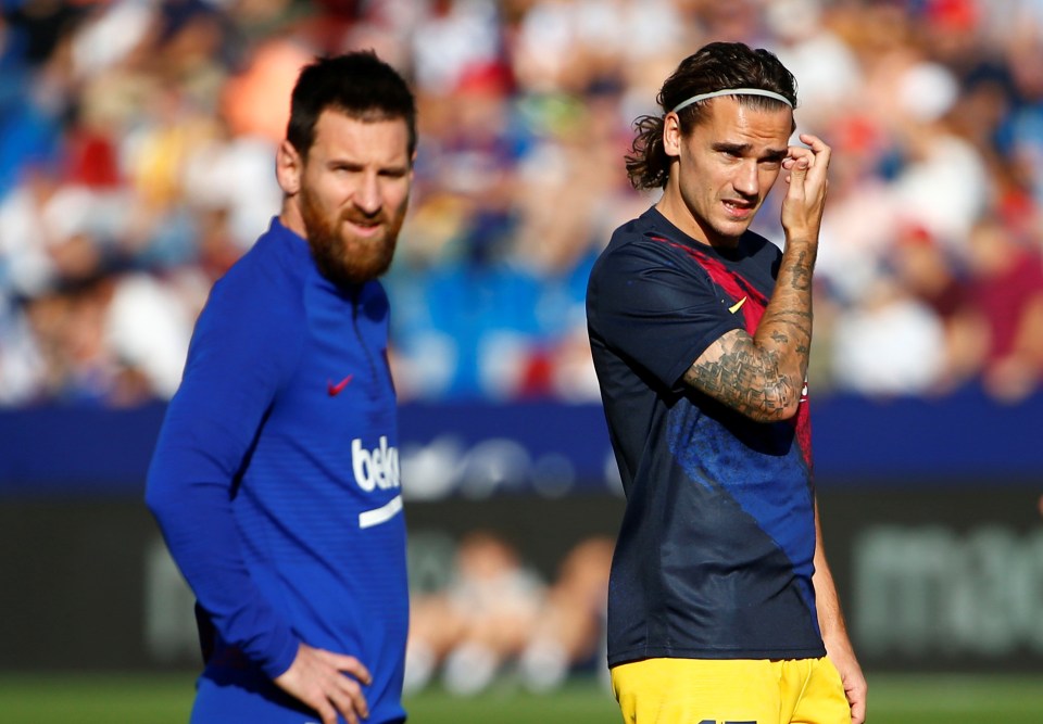 Antoine Griezmann (right) hopes Lionel Messi will stay at Barcelona