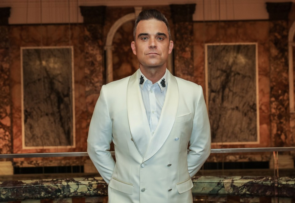 Singer Robbie Williams is leading a syndicate hoping to buy the world’s most expensive Banksy painting at auction