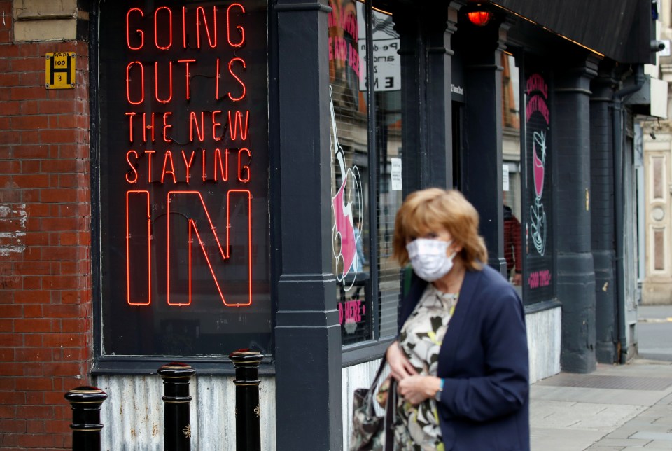 A woman wearing a mask in Manchester