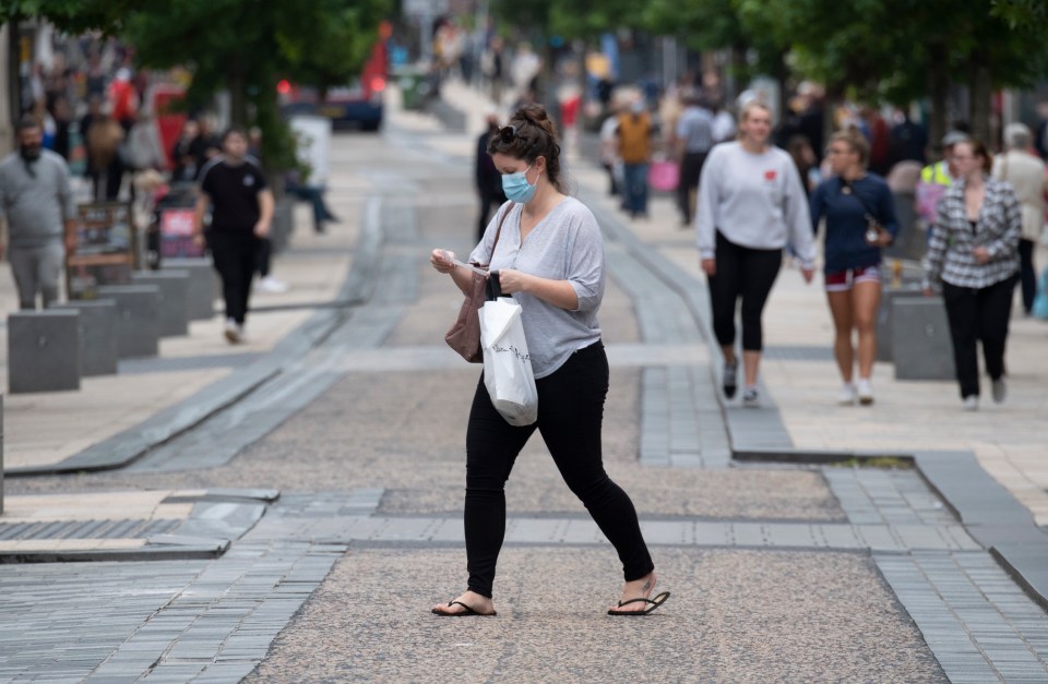 Shoppers on the streets of Preston - in danger of having a second lockdown imposed