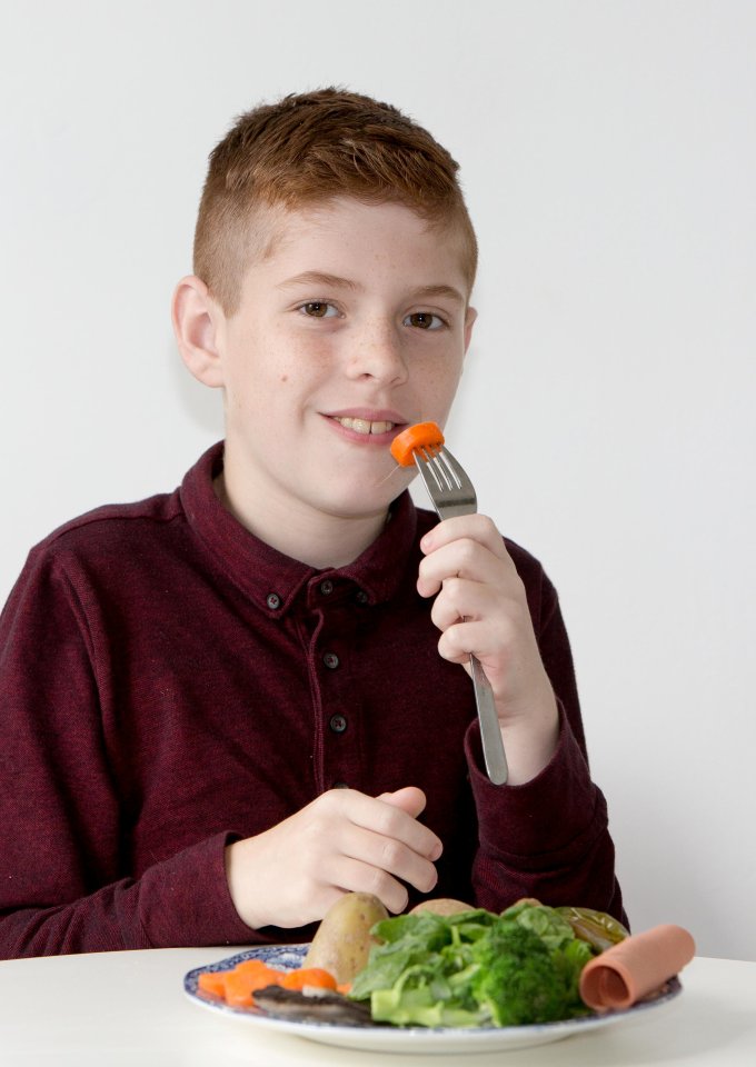 But the schoolboy is now able to tuck into a cooked meal for the first time