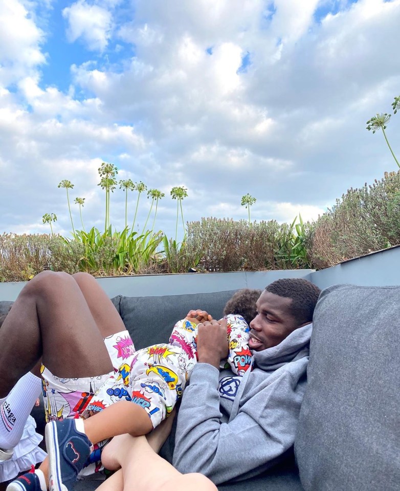 Paul Pogba cuddles his son while isolating 