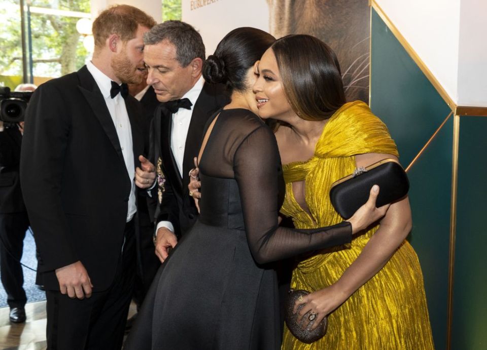 Meghan and Harry are seen at the Lion King premiere in July last year with the prince promoting his wife's voice over work with Disney boss Bob Iger