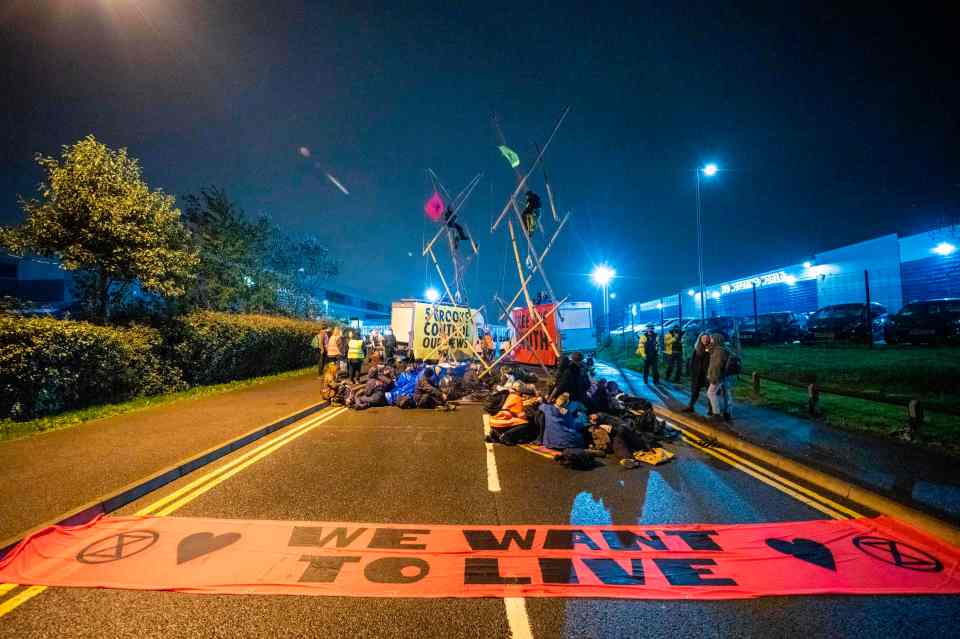 The protestors stood their ground outside many newspaper printers because they're not happy with the media coverage of climate change