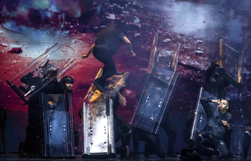 Riot shields littered the stage in the routine, which charted events in 2020