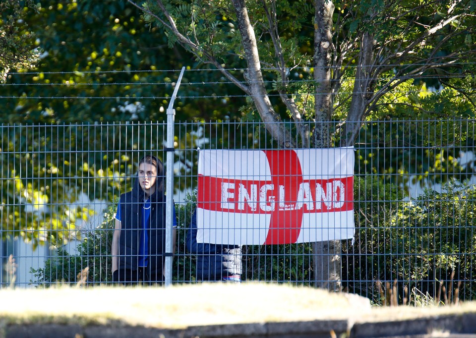 A handful of hardy fans made their way to peer into the behind-closed-doors game