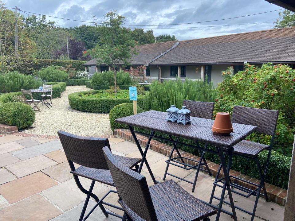 The converted courtyard is the centrepiece with the rooms lined up around it