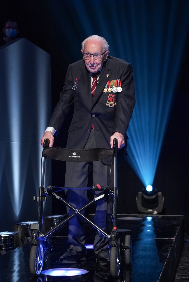 The 100-year-old World War Two veteran appears on the set with his famous walker