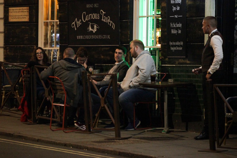 Groups of friends enjoy the cool weather in small groups before restrictions are introduced on Monday