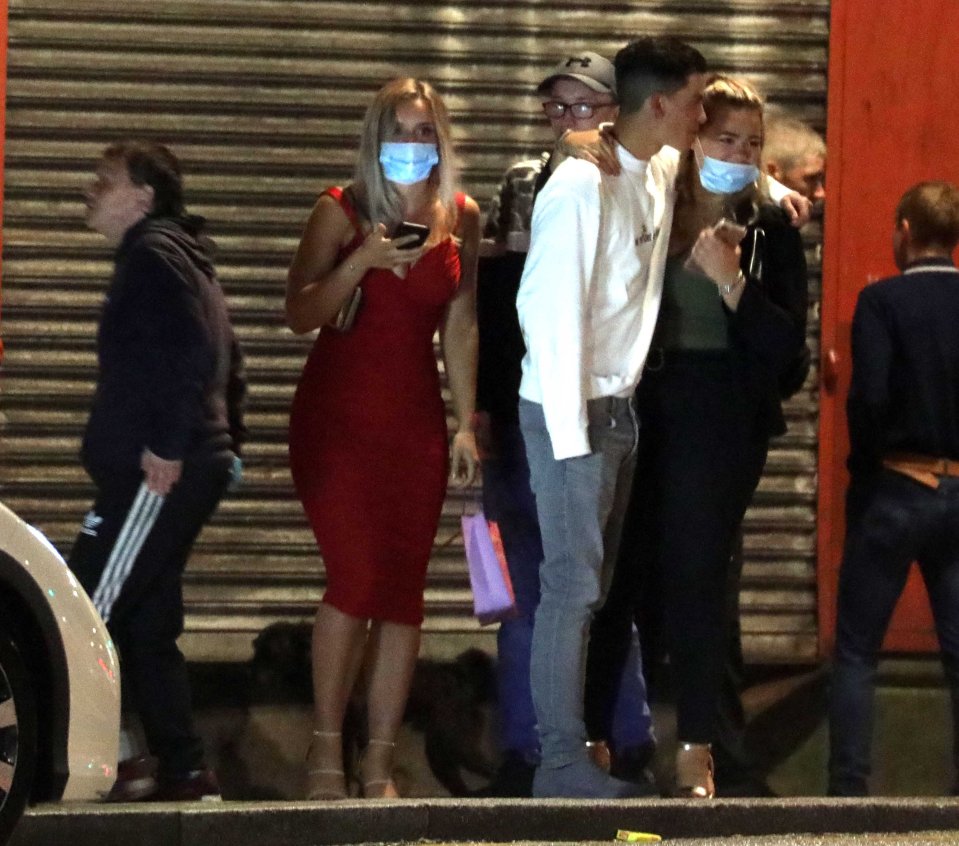 Masked up revellers hit the town last night