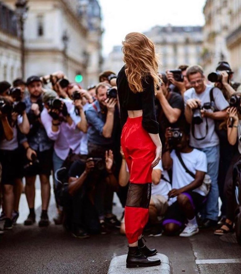 The stunning redhead posted a snap of her in front of a crowd of photographers