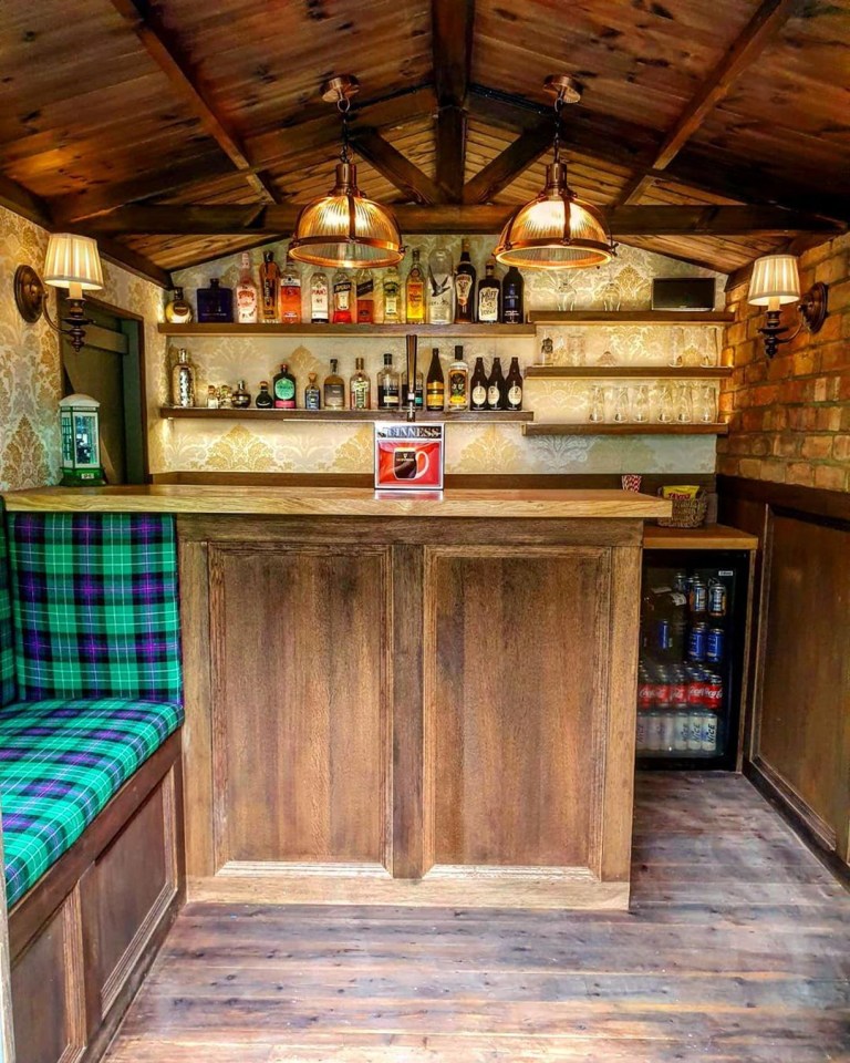 It's kitted out with a wooden bar, tartan seats and lighting 