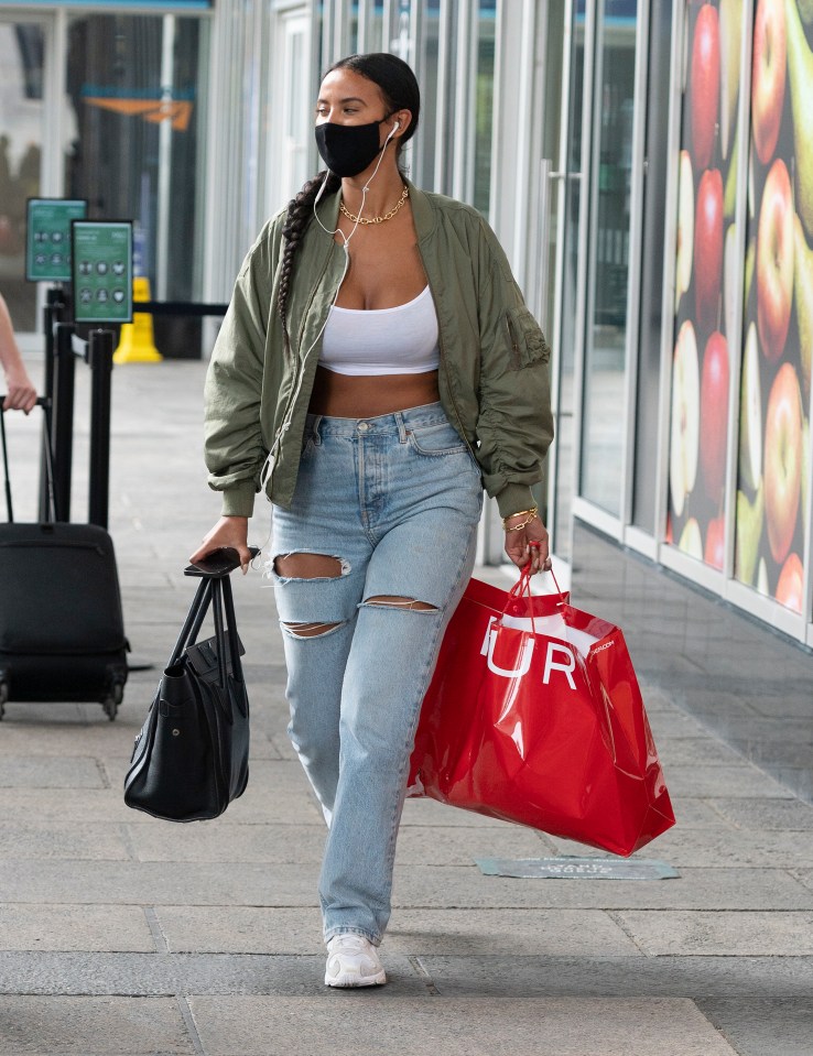 Maya Jama enhances her amazing curves with snug fitting jeans skimming her belly button