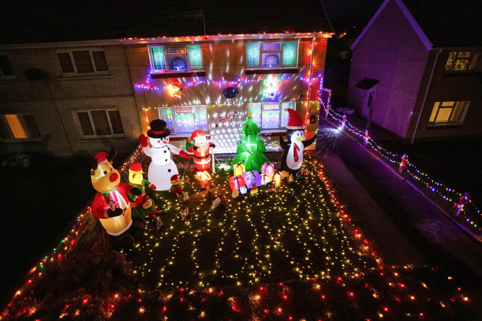 The display includes 3,000 fairy lights, sparkling snow, an 8ft inflatable snowman, as well as Santa and his reindeer