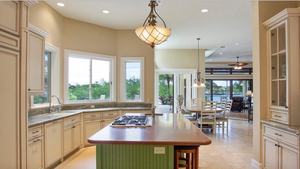 The house boasts a huge kitchen, seen here before it was done up