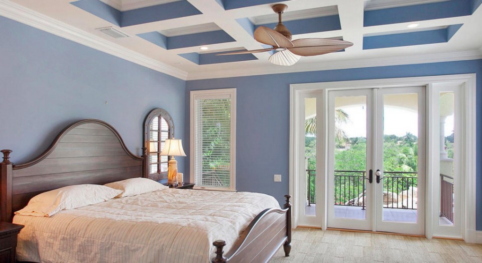 The master bedroom features a balcony overlooking the garden, and has been enlarged