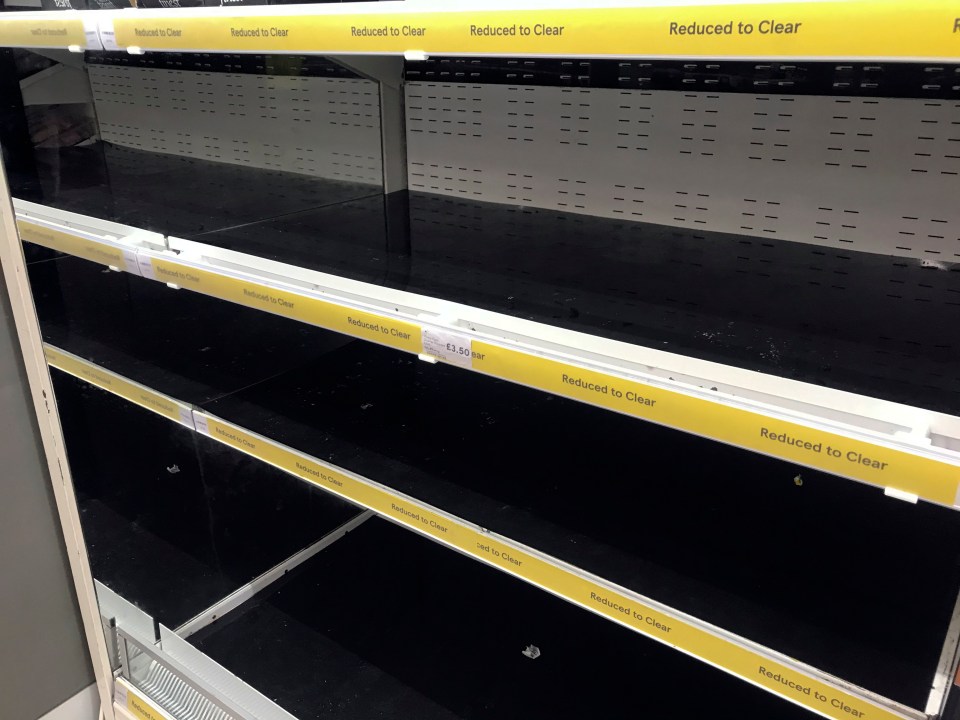 Empty reduced to clear shelves at a Tesco store in Portsmouth